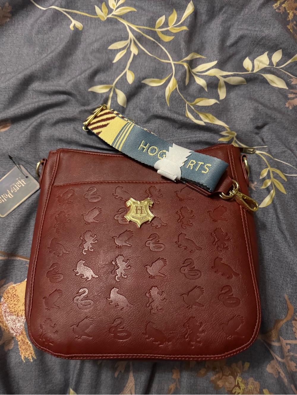 Warner Bros. Burgundy Hogwarts Embossed Messenger Bag with Blue Strap
